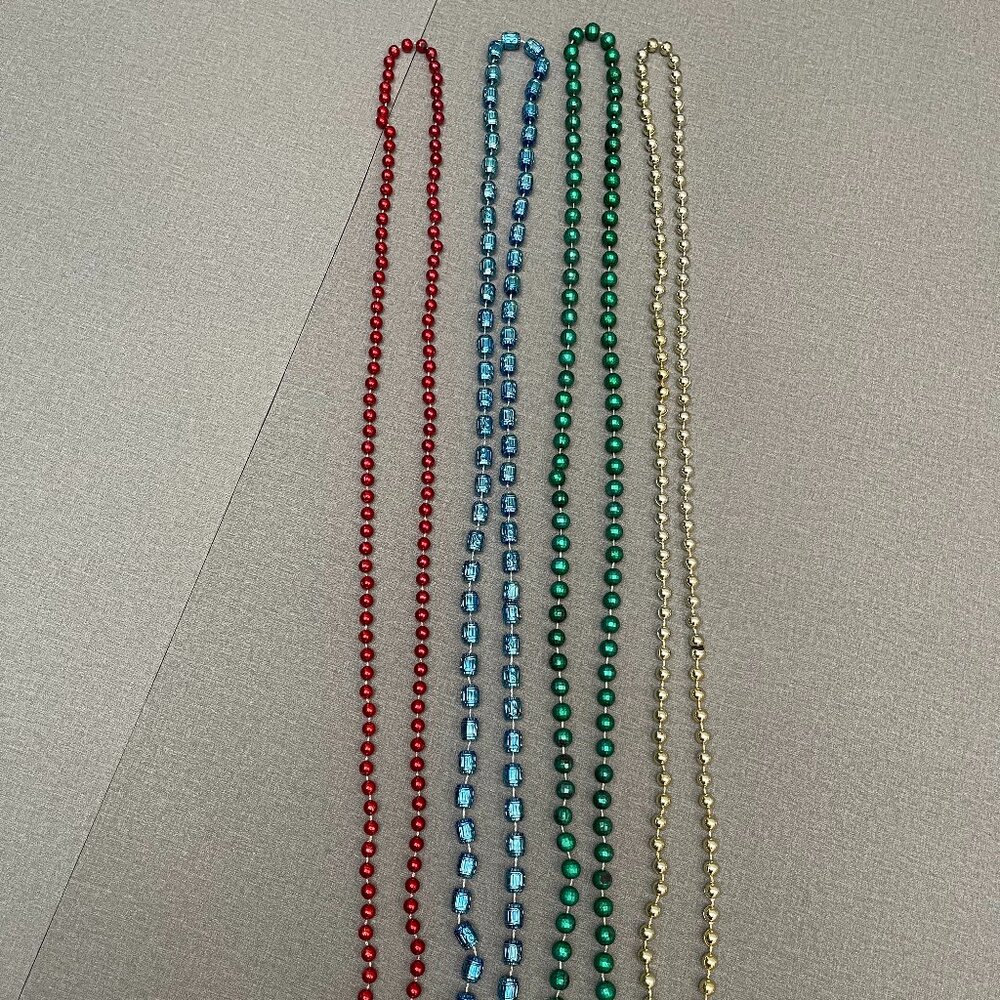 4 pack long decorative necklace and sweater necklace bundle
